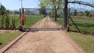 Completed automatic gate installation in Wellington after straightening the bent gate