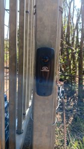 Semi-wireless infrared safety beam installed at an automatic gate in Wellington