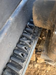 Damaged nylon rack removed during a heavy-duty gate motor repair in Wellington.